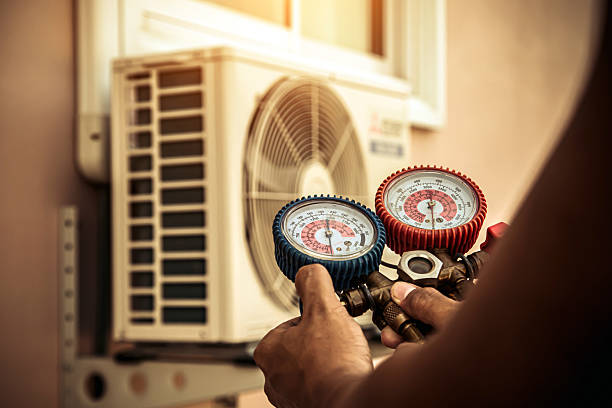Professional Air Conditioning Service technician working in South Saint Paul, MN